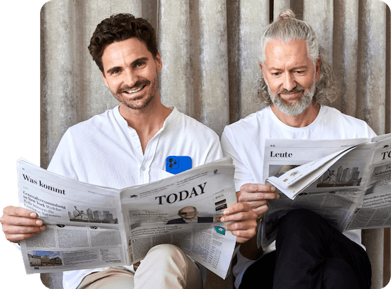 men reading newspaper